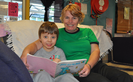 WELL DONE: Rosie's kindergarten teacher Judith Williams, who was named Queensland educator of the year, reads a book to student John Henry Noakes. WELL DONE: Rosie's kindergarten teacher Judith Williams, who was named Queensland educator of the year, reads a book to student John Henry Noakes.
