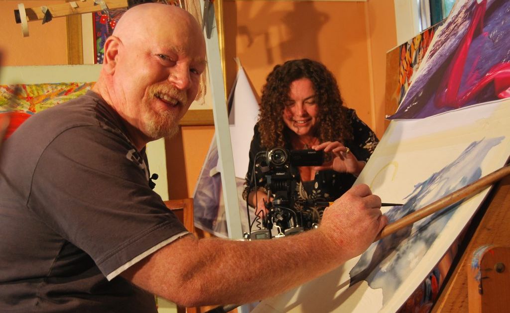 Sophia Stacey films artist Graeme Stevenson at work in his Murwillumbah studio for television. Sophia Stacey films artist Graeme Stevenson at work in his Murwillumbah studio for television.