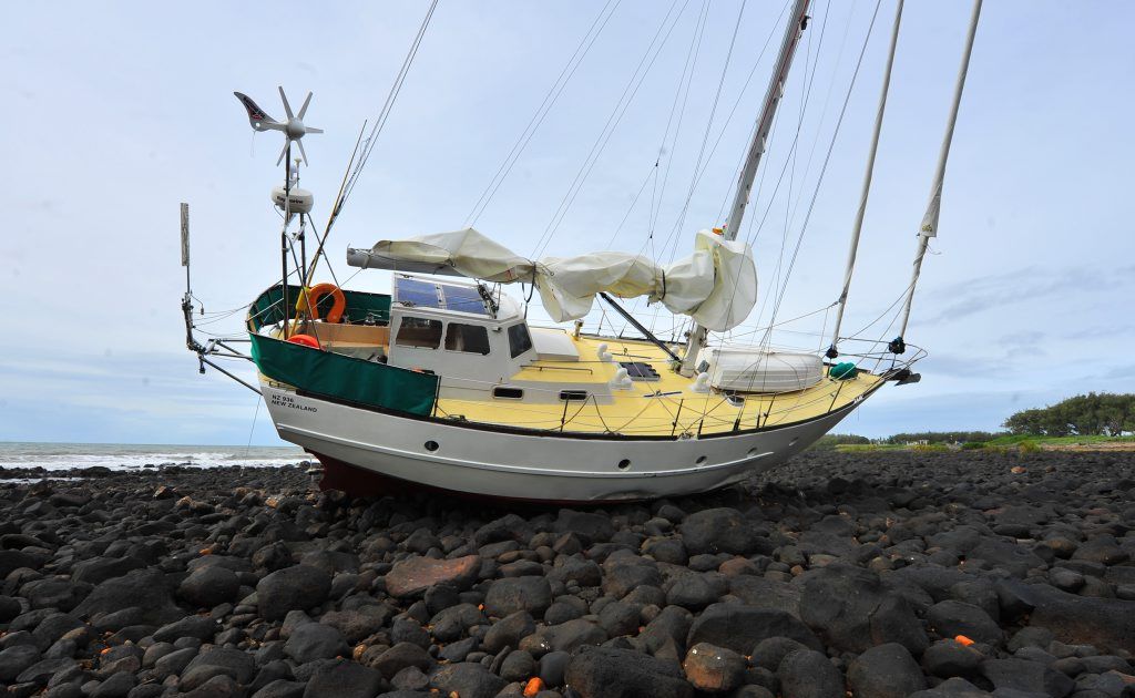 The yacht Stargull which ran aground on the rocks at Burnett Heads. Photo: Scottie Simmonds / NewsMail The yacht Stargull which ran aground on the rocks at Burnett Heads. Photo: Scottie Simmonds / NewsMail