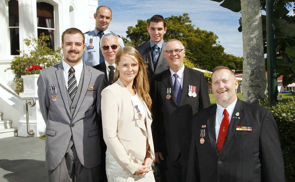 Award recipients for service in the floods in and around Ipswich (from left) Brendon Weber, Senior Constable Jon Kirkman, Andrew Shortland , Cassandra Broadfoot, Andrew Kelly, Jon Klaebe, and Jim Runham SC AFSM OAM, and (pictured left) firefighters Andrew Neil (left) and Brad Mills. Award recipients for service in the floods in and around Ipswich (from left) Brendon Weber, Senior Constable Jon Kirkman, Andrew Shortland , Cassandra Broadfoot, Andrew Kelly, Jon Klaebe, and Jim Runham SC AFSM OAM, and (pictured left) firefighters Andrew Neil (left) and Brad Mills.