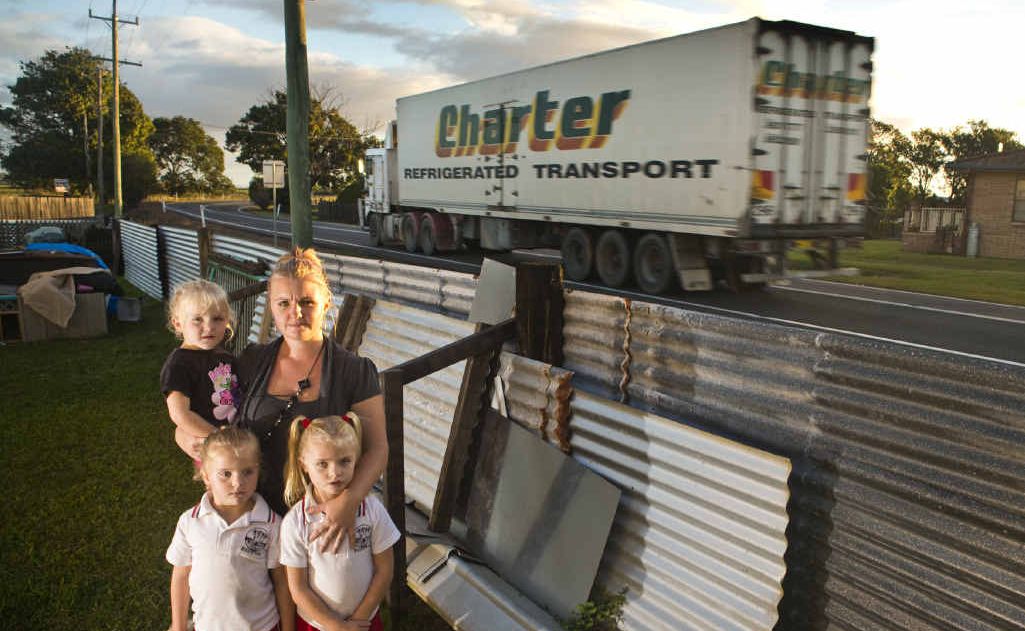 Krystal Gray with her girls Claudia, 3, Josslyn, 5, and Olivia Brown, 6, next to the fence which was destroyed by a truck on the Pacific Hwy in June 2010. Krystal Gray with her girls Claudia, 3, Josslyn, 5, and Olivia Brown, 6, next to the fence which was destroyed by a truck on the Pacific Hwy in June 2010.