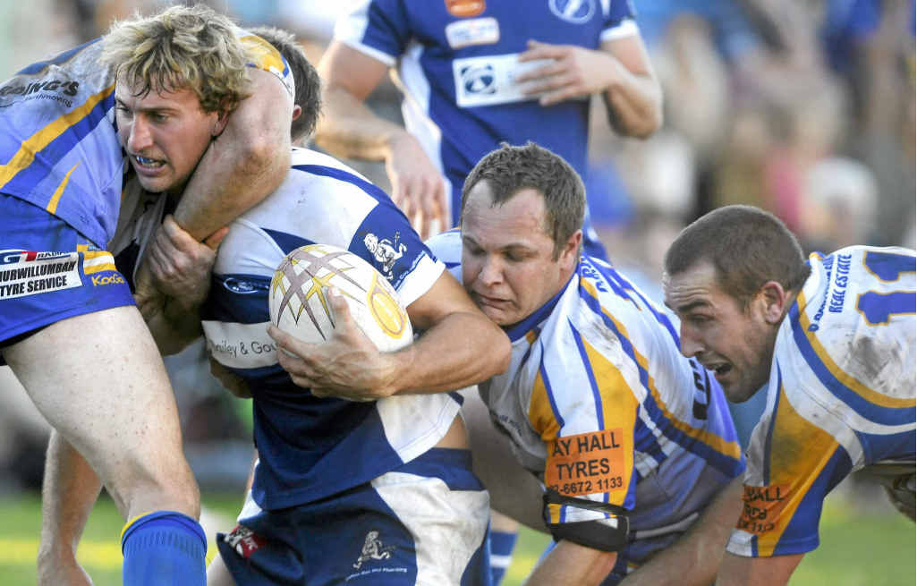 Ghosts Josh Donohoe feels the full force of the Murwillumbah defence during yesterday’s top-of-the-table clash at Grafton. Ghosts Josh Donohoe feels the full force of the Murwillumbah defence during yesterday’s top-of-the-table clash at Grafton.