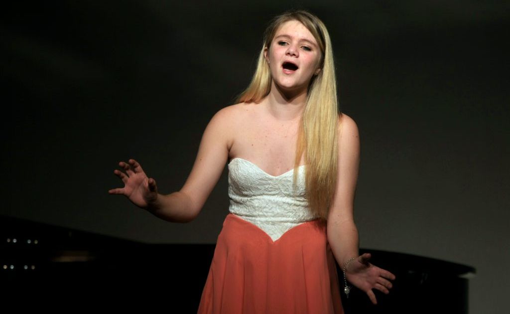 Jade Seaton takes to the stage for the vocal solo section. Jade Seaton takes to the stage for the vocal solo section.