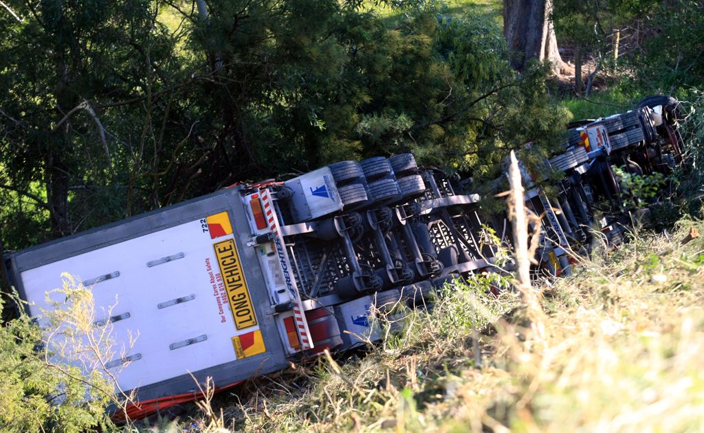The truck carrying fruit and vegetables rolled off the Pacific Hwy near Pottsville. The truck carrying fruit and vegetables rolled off the Pacific Hwy near Pottsville.