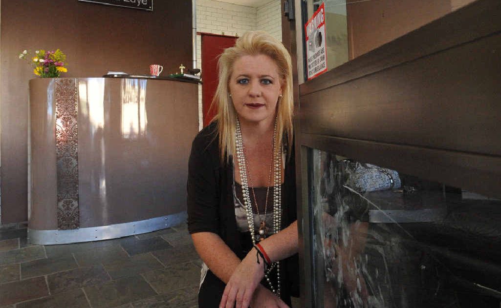 Donna Edye contemplates the cost of securing her hair salon after a vandal attack on Friday night. Donna Edye contemplates the cost of securing her hair salon after a vandal attack on Friday night.