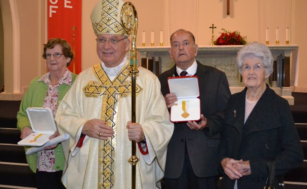 Bishop of Lismore the Most Reverend Geoffrey Jarrett D D, Marie Twohill, John McDonald and his wife Mary following presentation of their Papal awards. Bishop of Lismore the Most Reverend Geoffrey Jarrett D D, Marie Twohill, John McDonald and his wife Mary following presentation of their Papal awards.