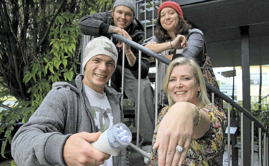 RESCUE team Kendall Pryor and Michael and Danielle Dean, with Yamba’s Lisa Westerman with her precious ring. RESCUE team Kendall Pryor and Michael and Danielle Dean, with Yamba’s Lisa Westerman with her precious ring.