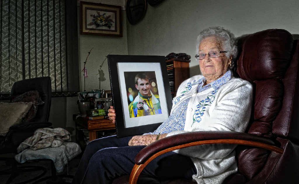 Rita Cowling of South Grafton with a picture of her grandson Michael Shelley - who has qualified to run in the Olympic marathon. Rita Cowling of South Grafton with a picture of her grandson Michael Shelley - who has qualified to run in the Olympic marathon.