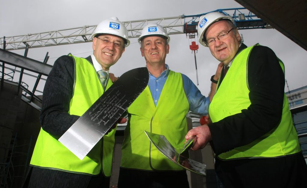 Vice chancellor Peter Lee, Rob Yates of Hutchinson Builders and SCU chancellor John Dowd at a topping out ceremony to celebration a construction milestone at SCU Gold Coast-Tweed campus. Vice chancellor Peter Lee, Rob Yates of Hutchinson Builders and SCU chancellor John Dowd at a topping out ceremony to celebration a construction milestone at SCU Gold Coast-Tweed campus.