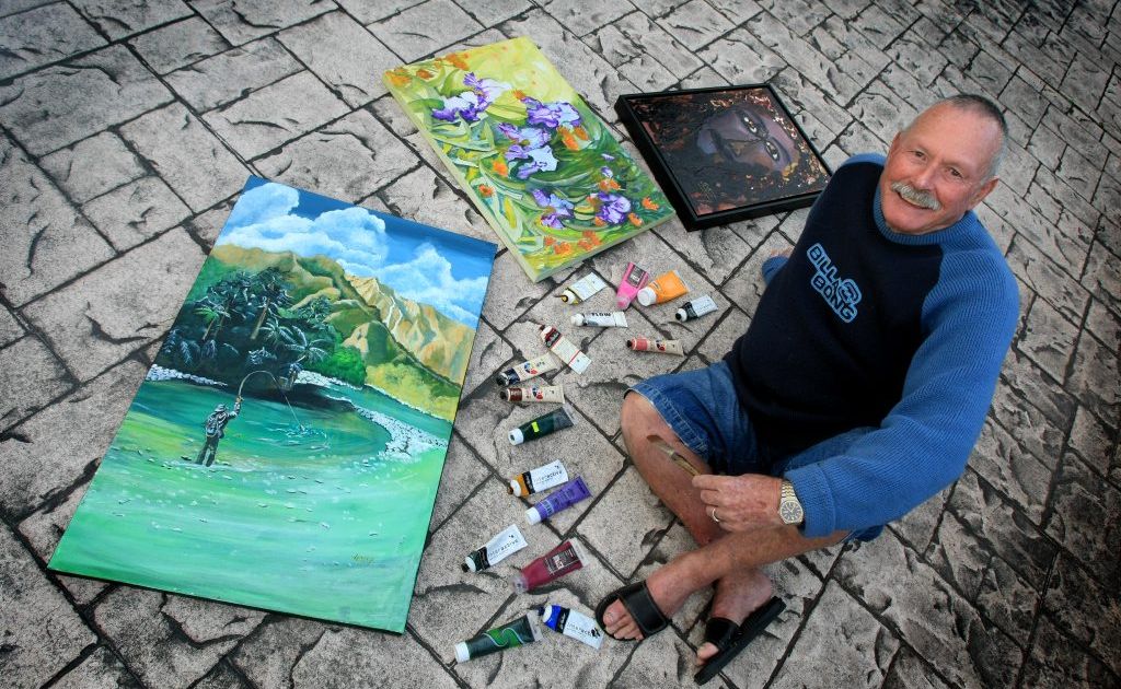 Tweed artist Max Jessop with some of his paintings. Tweed artist Max Jessop with some of his paintings.