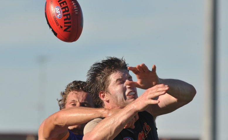 Carlton's Sam Rowe has his mark spoilt during a match against the Brisbane Lions. Carlton's Sam Rowe has his mark spoilt during a match against the Brisbane Lions.