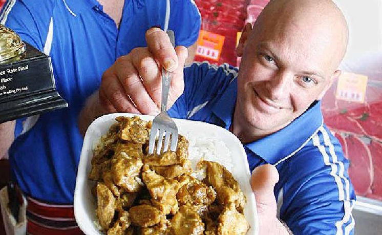 BEST WET DISH: Simon and Jeremy Neller from Mega Meats celebrate the win for their chicken korma. BEST WET DISH: Simon and Jeremy Neller from Mega Meats celebrate the win for their chicken korma.
