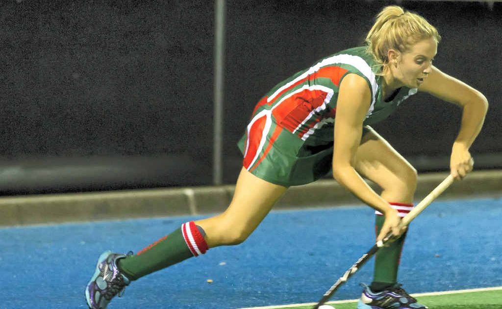 Maddy Richey pushing out during a penalty corner play for her Demons hockey club A-grade side. Maddy Richey pushing out during a penalty corner play for her Demons hockey club A-grade side.