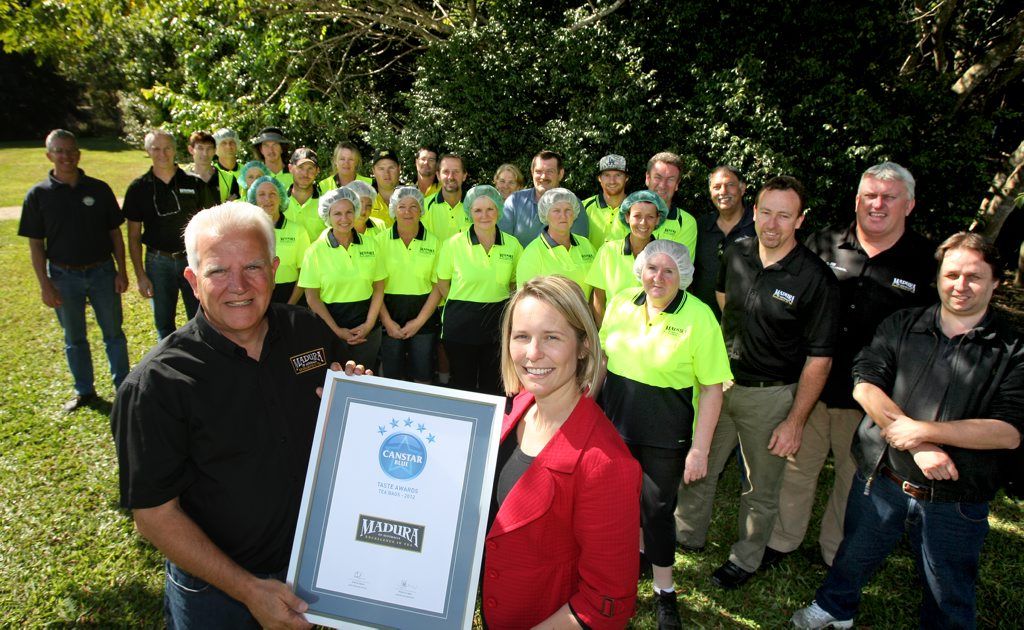 Madura Staff Celebrate their award on site at Murwillumbah. Photo: Blainey Woodham / Daily News Madura Staff Celebrate their award on site at Murwillumbah. Photo: Blainey Woodham / Daily News