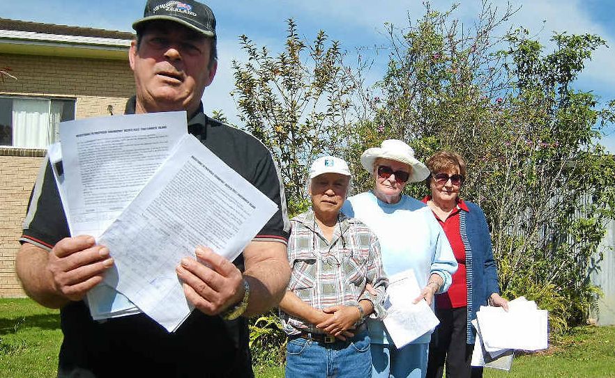 Bill Daniels holds a petition opposed to a new crematorium in Grafton. Supporting him are Peter Lee, Claire Lee and Daphne Batson. Bill Daniels holds a petition opposed to a new crematorium in Grafton. Supporting him are Peter Lee, Claire Lee and Daphne Batson.