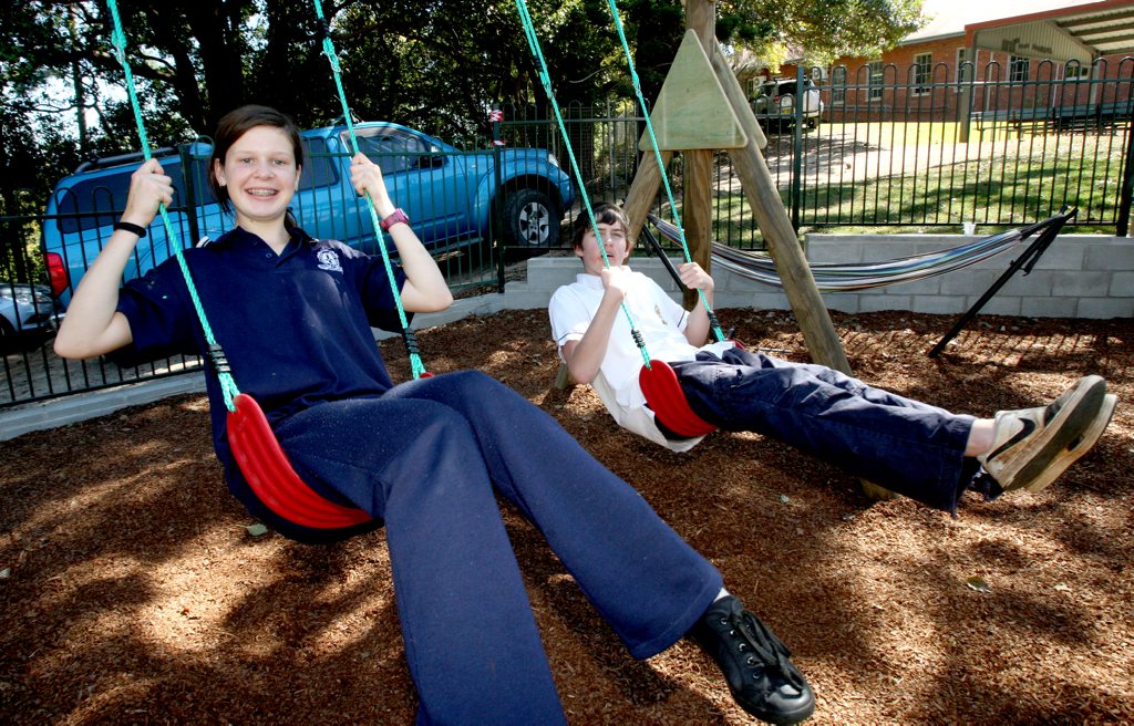 Murwillumbah High School students Stephanie Van Honk and Daniel Whitney-Clark test out the new swings. Murwillumbah High School students Stephanie Van Honk and Daniel Whitney-Clark test out the new swings.