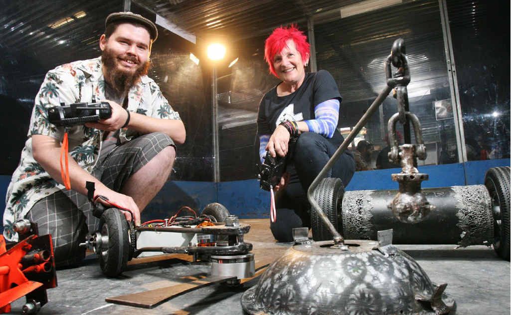 Miles Blow and Jules Pitts show off their robots to be used in the national Robowars competition. Miles Blow and Jules Pitts show off their robots to be used in the national Robowars competition.