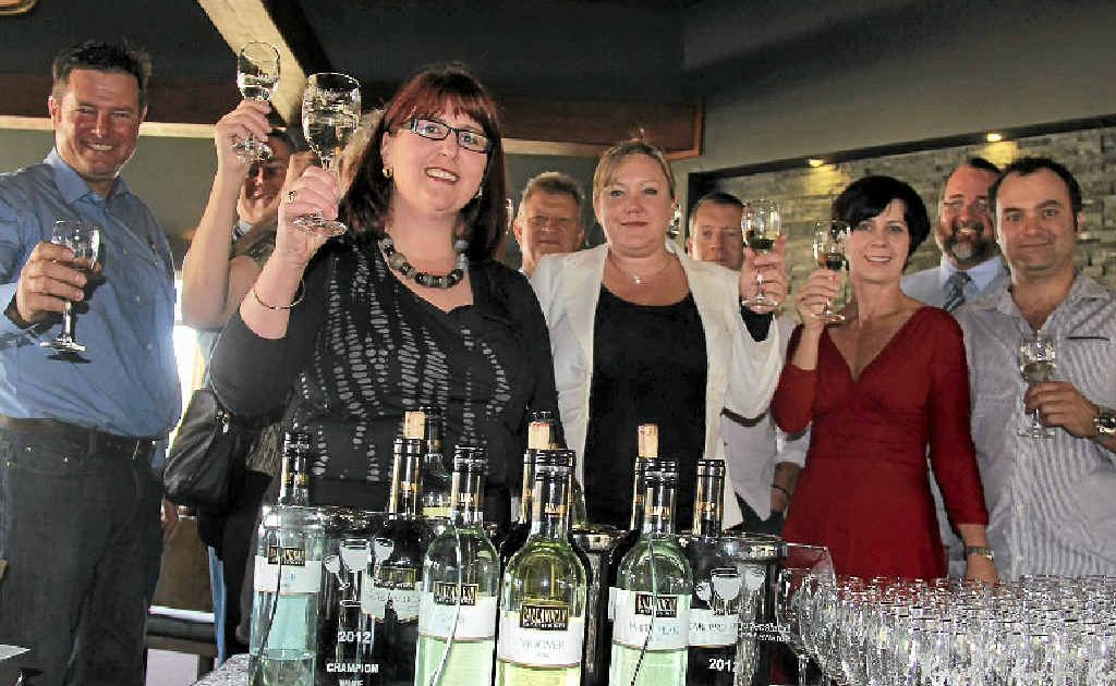 Ballandean Estate Winery’s Leeanne Puglisi-Gangemi and her award-winning wines at Rupert’s yesterday, is pictured with Sarah Reeves and Rupert’s owners, Karen Bradshaw and Paul Spiteri. Cr Cameron Gow and Mayor Peter Blundell also come along to show their support. Ballandean Estate Winery’s Leeanne Puglisi-Gangemi and her award-winning wines at Rupert’s yesterday, is pictured with Sarah Reeves and Rupert’s owners, Karen Bradshaw and Paul Spiteri. Cr Cameron Gow and Mayor Peter Blundell also come along to show their support.