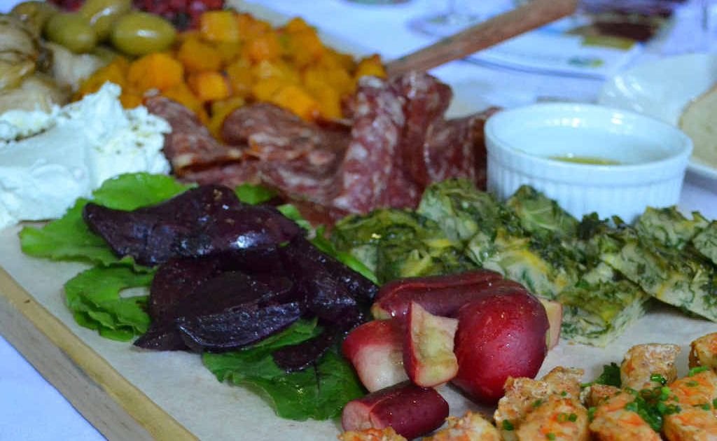 Locally inspired antipasto plate featuring Yamba prawns, Wells Crossing radishes, roast Clarenza Gold garlic cloves and local preserves among other goodies Locally inspired antipasto plate featuring Yamba prawns, Wells Crossing radishes, roast Clarenza Gold garlic cloves and local preserves among other goodies