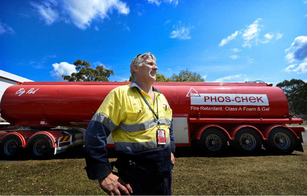 Operations manager of Phos-Chek, Jim Gilli, with the tanker that’s been providing fire retardant, gel and foam for aerial firefighting in the Clarence region for more than a week. Operations manager of Phos-Chek, Jim Gilli, with the tanker that’s been providing fire retardant, gel and foam for aerial firefighting in the Clarence region for more than a week.