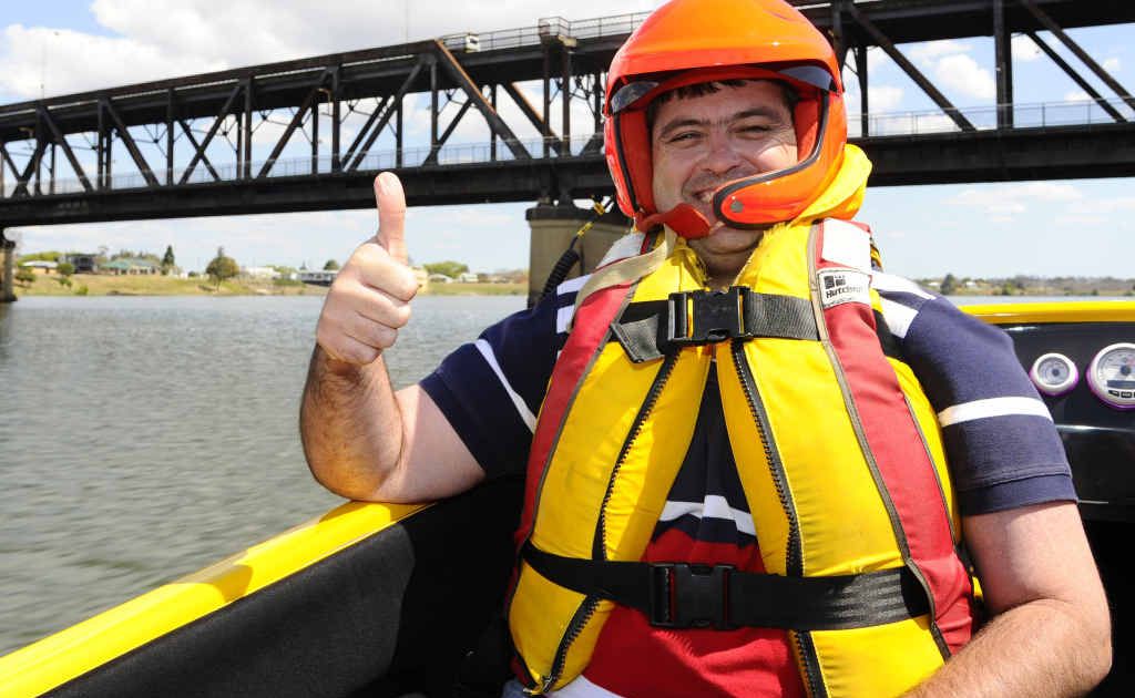 Clarence Valley Councillor Richie Williamson gives the thumbs up before being taken for a run by Jason Disson in his boat Bazinga on the Clarence River on Saturday. Clarence Valley Councillor Richie Williamson gives the thumbs up before being taken for a run by Jason Disson in his boat Bazinga on the Clarence River on Saturday.