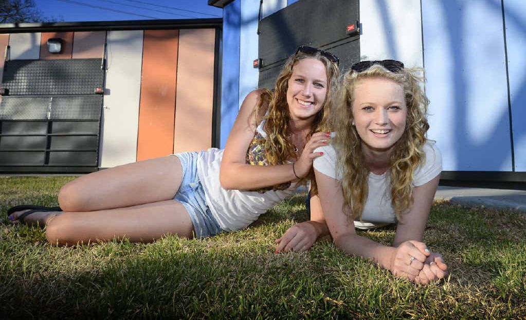 Eyes Wide youth committee members Natasha Gibson and Natalie Campbell take a break before today’s project launch in Market Square. Eyes Wide youth committee members Natasha Gibson and Natalie Campbell take a break before today’s project launch in Market Square.