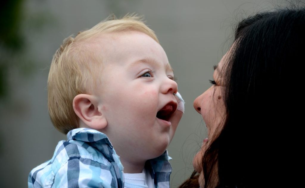 Mum and dad Laura and Tony Hurley with son Luca. Photo: John Gass / Daily News Mum and dad Laura and Tony Hurley with son Luca. Photo: John Gass / Daily News