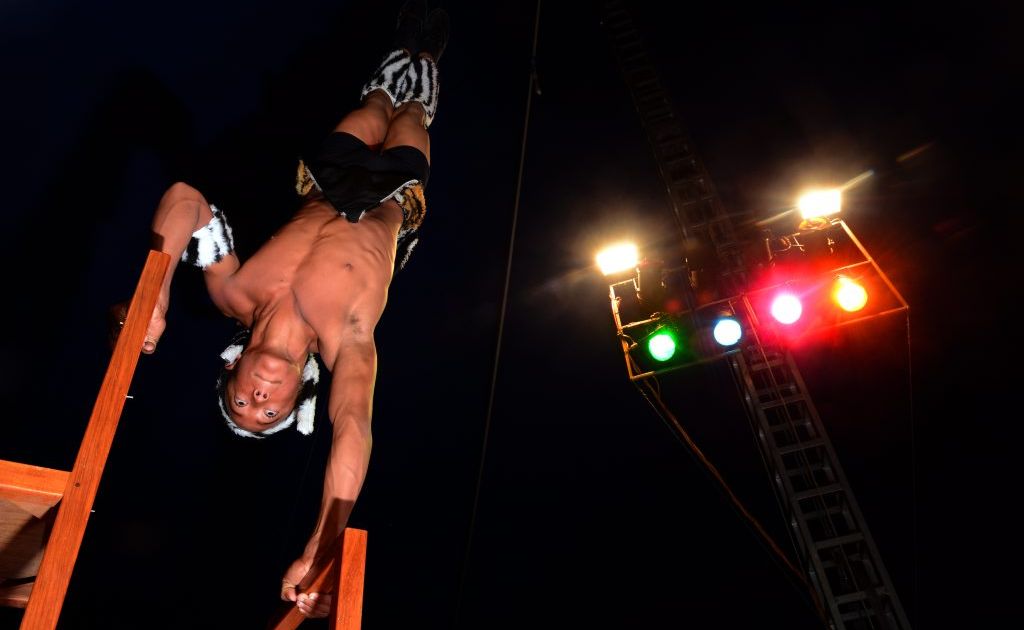 Remi Rodriguez, 13, atop a stack of chairs. Remi Rodriguez, 13, atop a stack of chairs.
