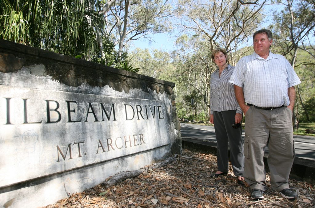 Councilors Glenda Mather and Neil Fisher at the start of Pilbeam Drive which has been at the centre of a dispute. Photo: Chris Ison / The Morning Bulletin Councilors Glenda Mather and Neil Fisher at the start of Pilbeam Drive which has been at the centre of a dispute. Photo: Chris Ison / The Morning Bulletin