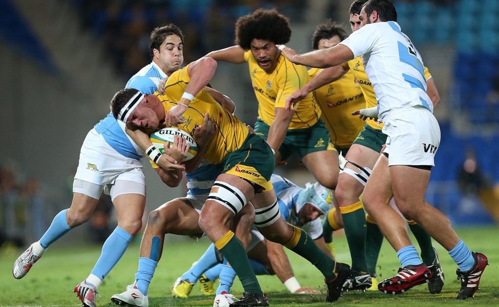 GOLD COAST, AUSTRALIA - SEPTEMBER 15: Kane Douglas of the Australian Wallabies is tackled during the Rugby Championship match between the Australian Wallabies and Argentina at Skilled Park on September 15, 2012 on the Gold Coast, Australia. (Photo by Chris Hyde/Getty Images) GOLD COAST, AUSTRALIA - SEPTEMBER 15: Kane Douglas of the Australian Wallabies is tackled during the Rugby Championship match between the Australian Wallabies and Argentina at Skilled Park on September 15, 2012 on the Gold Coast, Australia. (Photo by Chris Hyde/Getty Images)