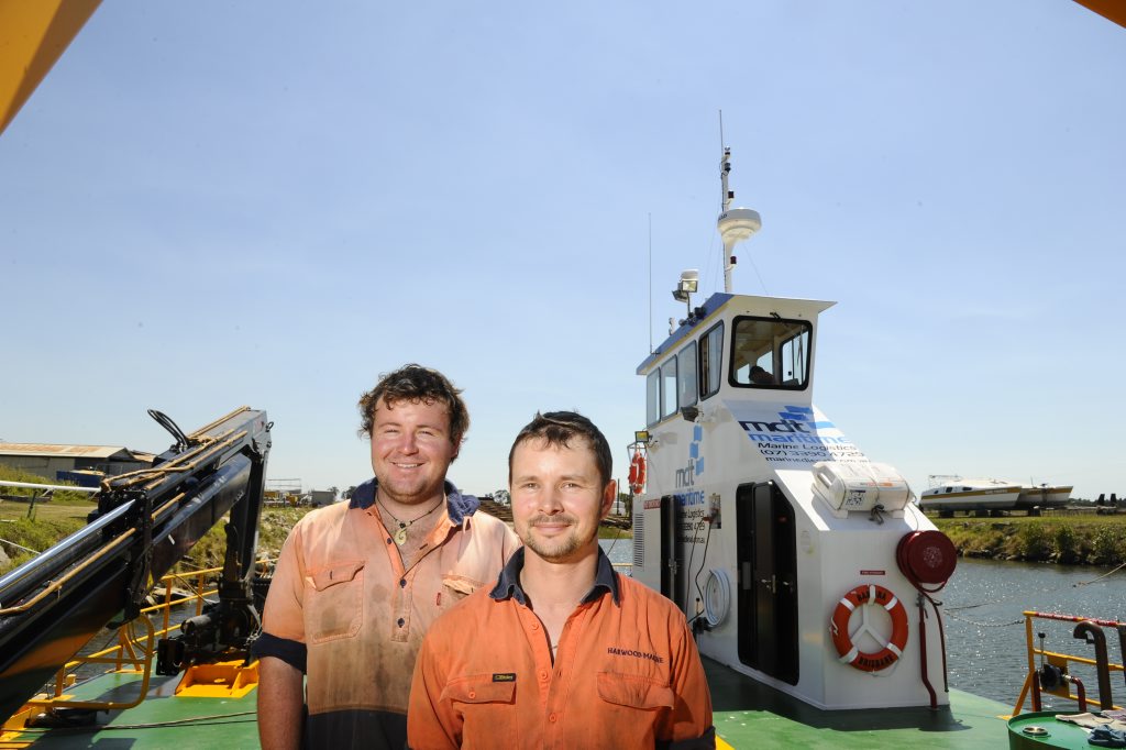 Harwood Marine's apprentice marine mechanic Trent Carr and marine mechanic Sean Waite at the front of one of the boats built at Harwood Marine recently. Photo: JoJo Newby / The Daily Examiner Harwood Marine's apprentice marine mechanic Trent Carr and marine mechanic Sean Waite at the front of one of the boats built at Harwood Marine recently. Photo: JoJo Newby / The Daily Examiner