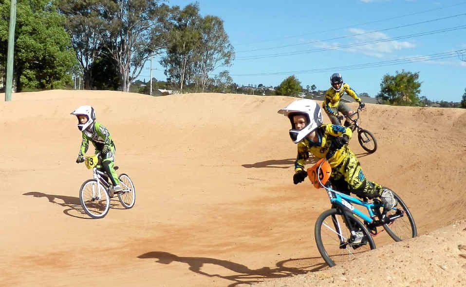 Aaron and Noah Sharrock racing with their father Andrew at the South Grafton BMX track on Saturday. Photo: Contributed Aaron and Noah Sharrock racing with their father Andrew at the South Grafton BMX track on Saturday. Photo: Contributed