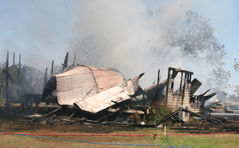 BURNT TO THE GROUND: A Greycliffe family of seven lost everything in this house fire on Wednesday morning. BURNT TO THE GROUND: A Greycliffe family of seven lost everything in this house fire on Wednesday morning.