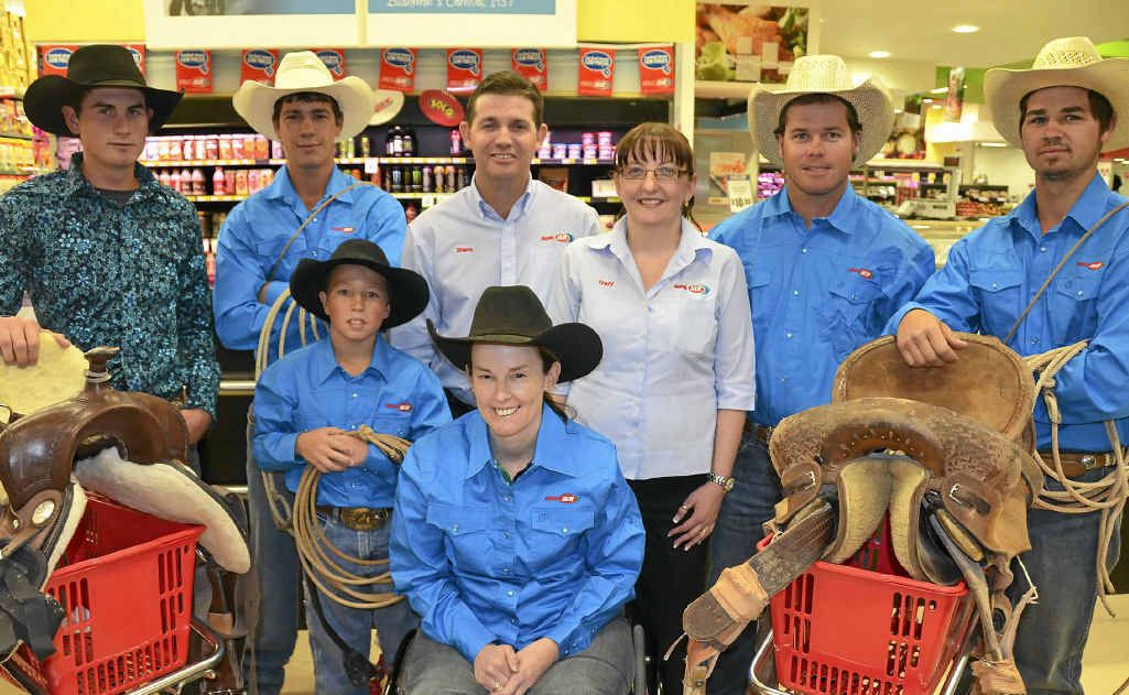 (Back, from left) Sponsored riders Joel Chevalley, Mitch Eastwell, Blake Weier, Shane and Tracy Smith of Supa IGA Warwick, Mark Collins, Brock Eastwell and (front) Kristy Banks. (Back, from left) Sponsored riders Joel Chevalley, Mitch Eastwell, Blake Weier, Shane and Tracy Smith of Supa IGA Warwick, Mark Collins, Brock Eastwell and (front) Kristy Banks.