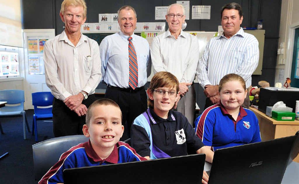 MEETING NEEDS: Donors (from left) Peter Price, Neil Harvey, Bob McNamara and Joe Richardson watch as Leichhardt State School students Zachary Brown, Aiden MacBeth and Angel-Lee Bate use their new computers. MEETING NEEDS: Donors (from left) Peter Price, Neil Harvey, Bob McNamara and Joe Richardson watch as Leichhardt State School students Zachary Brown, Aiden MacBeth and Angel-Lee Bate use their new computers.