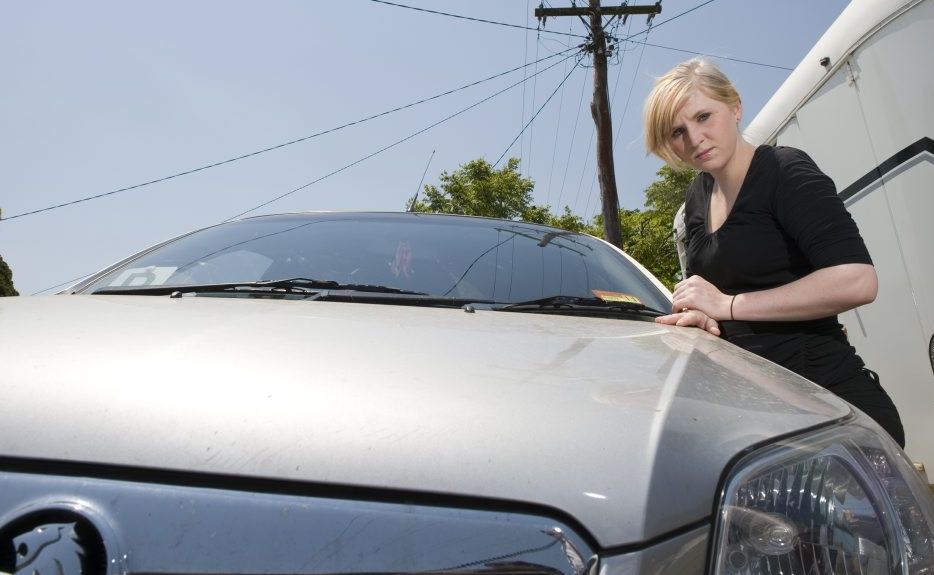 Cindy’s Convenience Store worker Sherrin Mann shows the scratches caused by a powerline falling on her car. Cindy’s Convenience Store worker Sherrin Mann shows the scratches caused by a powerline falling on her car.