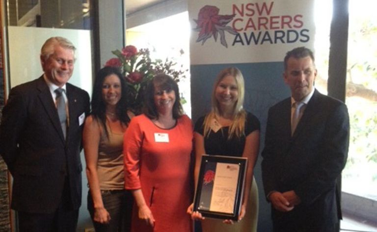 NSW Carers Awards at Parliament House: MP Geoff Provest, Owana Stacey (mother of NKC participant), Leone Crayden (On Track CEO), Caroline Haydon (NKC Caseworker), Minister for Ageing and Disability Andrew Constance. Photo: Contributed NSW Carers Awards at Parliament House: MP Geoff Provest, Owana Stacey (mother of NKC participant), Leone Crayden (On Track CEO), Caroline Haydon (NKC Caseworker), Minister for Ageing and Disability Andrew Constance. Photo: Contributed