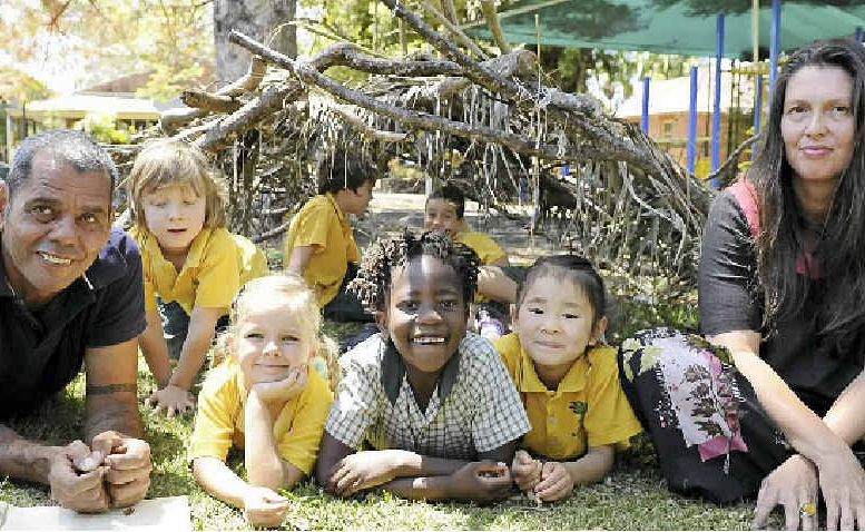 CROSS CULTURE: Luke Close and Penny Evans with Matilda Ryzak, Zawadi Brodie, Mirai Katagiri, Vinnie Morris, Aaron Spry and Tiggy Harling, in one of two gunyas built in the Bangalow school playground. CROSS CULTURE: Luke Close and Penny Evans with Matilda Ryzak, Zawadi Brodie, Mirai Katagiri, Vinnie Morris, Aaron Spry and Tiggy Harling, in one of two gunyas built in the Bangalow school playground.