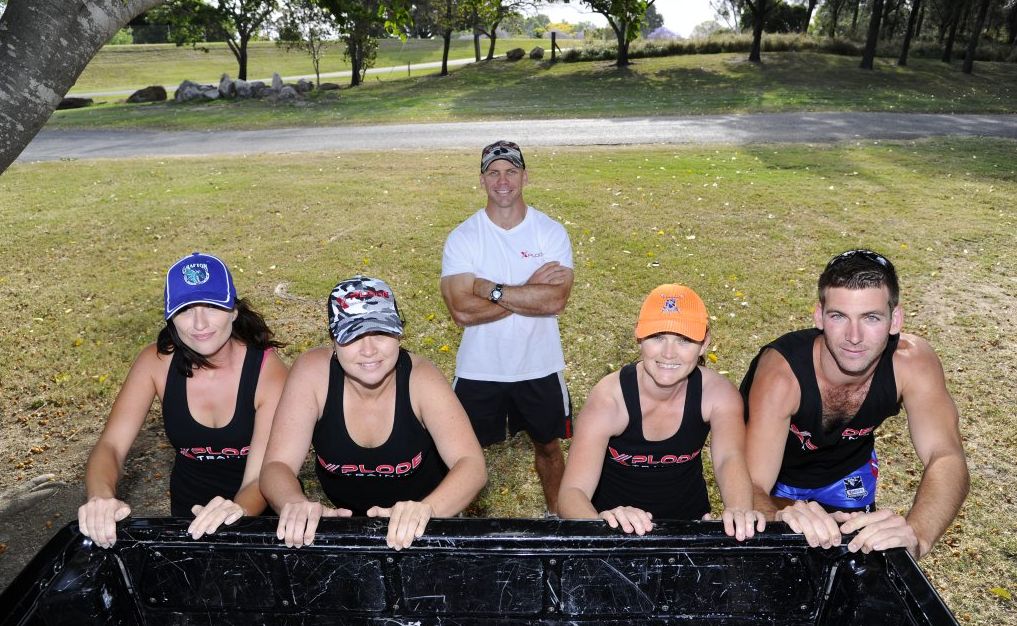 Warrior Dash participants Mary Squires, Keiran Shanley, Renee Fahey and Alex Jefferies under the watchful eye of trainer Craig Nipperess (back) at Corcoran Park. Warrior Dash participants Mary Squires, Keiran Shanley, Renee Fahey and Alex Jefferies under the watchful eye of trainer Craig Nipperess (back) at Corcoran Park.