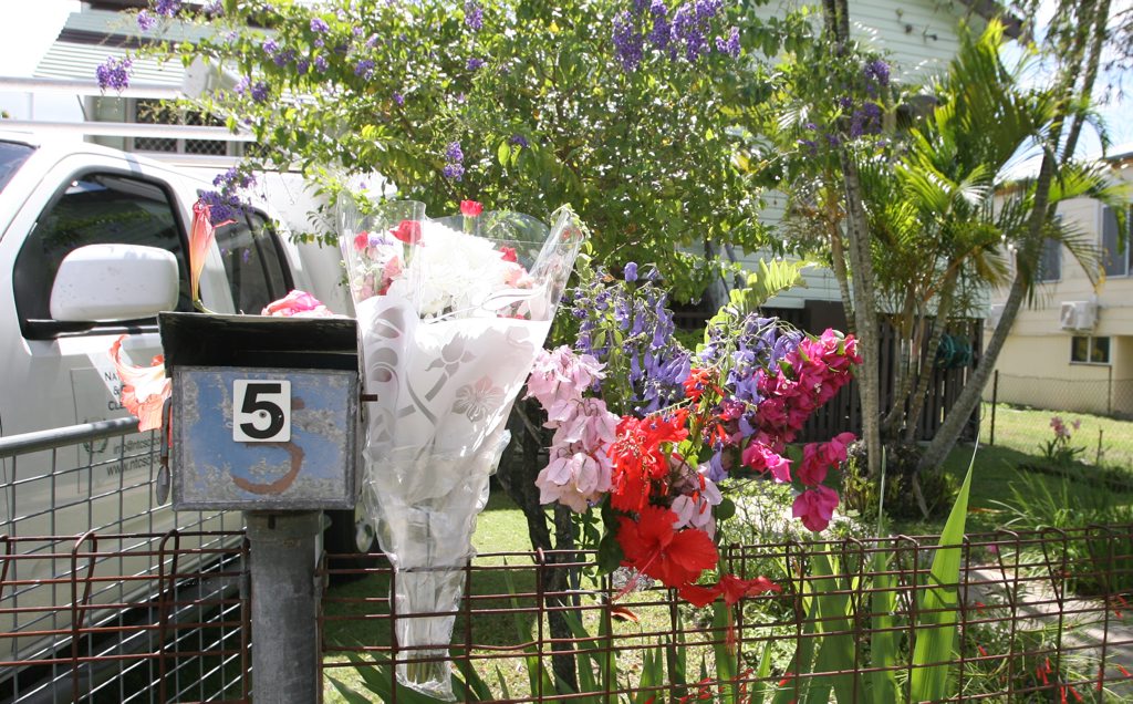 Floral tributes placed near the letterbox of 5 Bracher St where an elderly couple died on Tuesday. Floral tributes placed near the letterbox of 5 Bracher St where an elderly couple died on Tuesday.