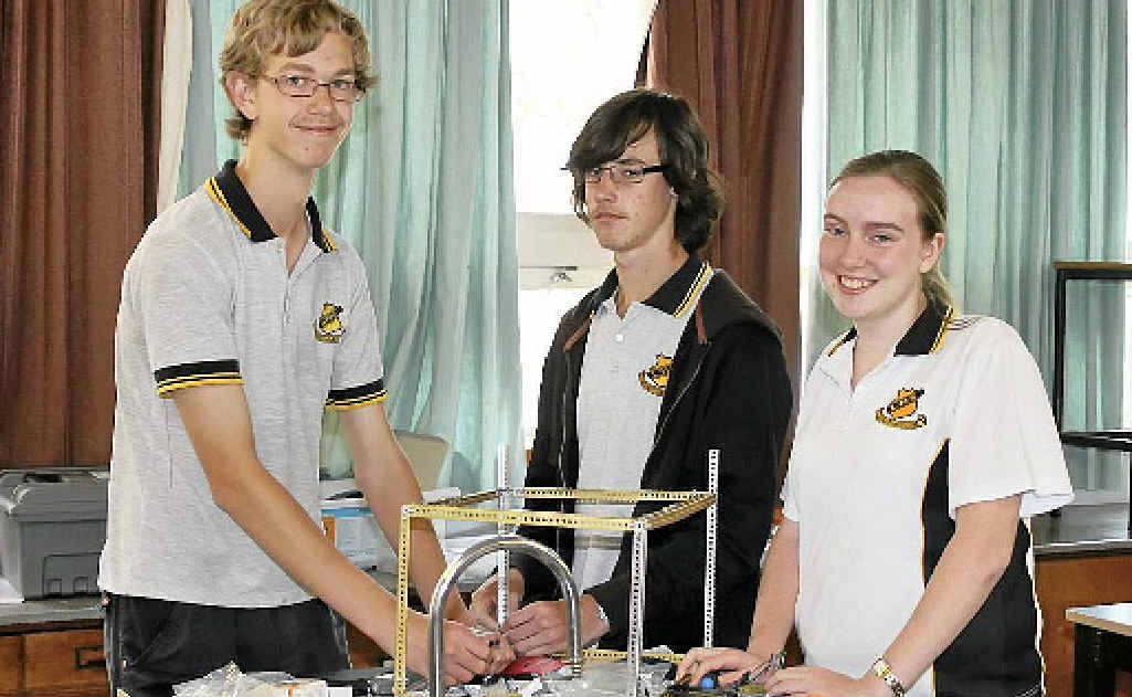 ROBITICS TEAM: Christian Evers, Cory Edmondstone, and Grace Cook. ROBITICS TEAM: Christian Evers, Cory Edmondstone, and Grace Cook.