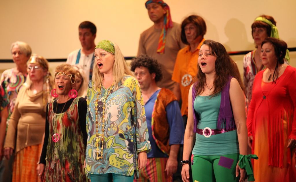 Singers warm up their vocal chords for the Christmas Variety Concert. Photo: Contributed Singers warm up their vocal chords for the Christmas Variety Concert. Photo: Contributed