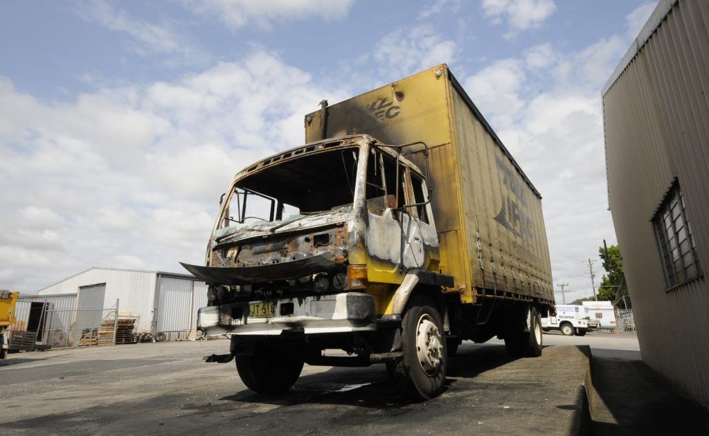 Fire damaged two trucks just after midnight at Laurie Predebon Truck repairs in South Lismore. Fire damaged two trucks just after midnight at Laurie Predebon Truck repairs in South Lismore.