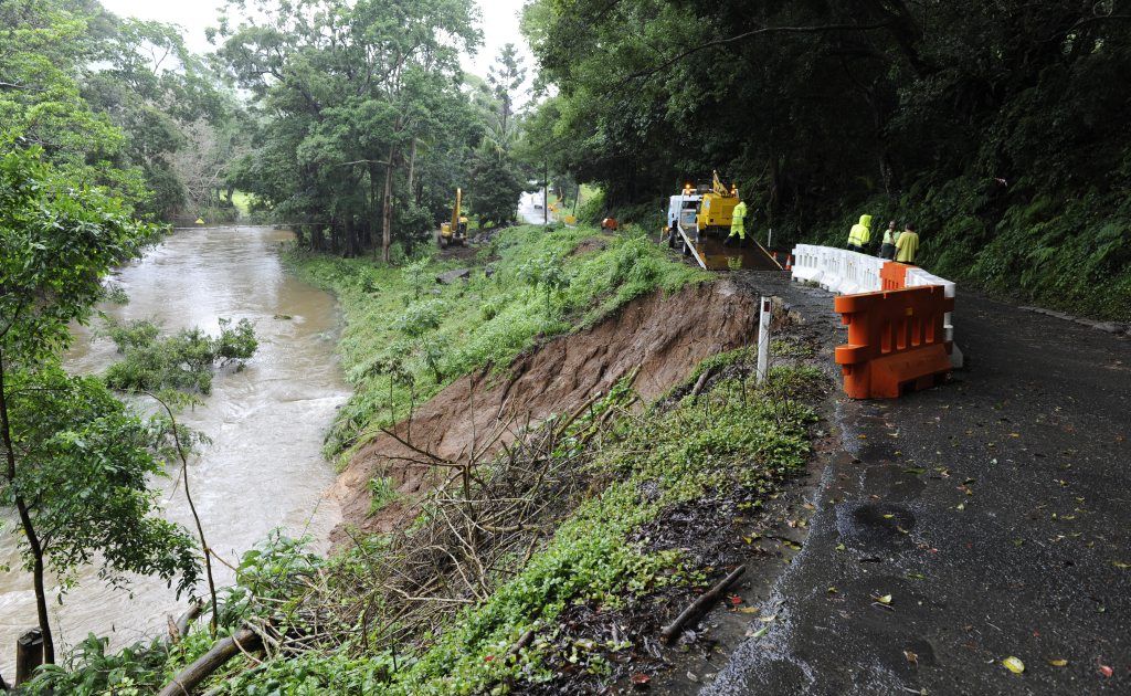 Crews start work to stabilise the landslip on Upper Wilsons Creek road yesterday. Photo Kate O'Neill/The Northern Star. Crews start work to stabilise the landslip on Upper Wilsons Creek road yesterday. Photo Kate O'Neill/The Northern Star.
