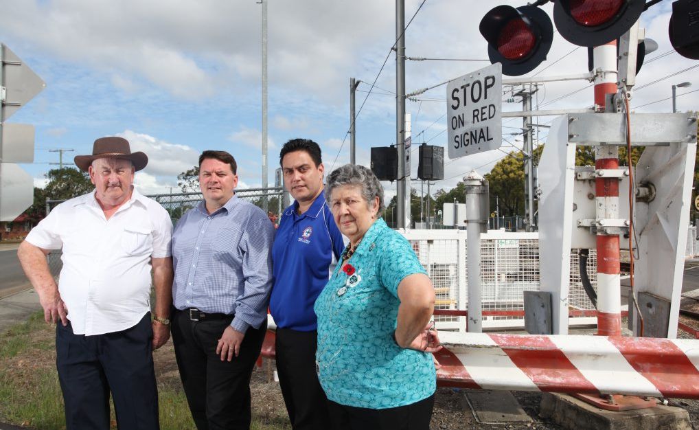 Andrew Hopkins, Luke Smith, Michael Latter and Kathy Webber are lobbying for an alternative access point to be made out of Bethania when the emergency gates are shut down at the level crossing. Photo: Inga Williams / The Reporter Andrew Hopkins, Luke Smith, Michael Latter and Kathy Webber are lobbying for an alternative access point to be made out of Bethania when the emergency gates are shut down at the level crossing. Photo: Inga Williams / The Reporter