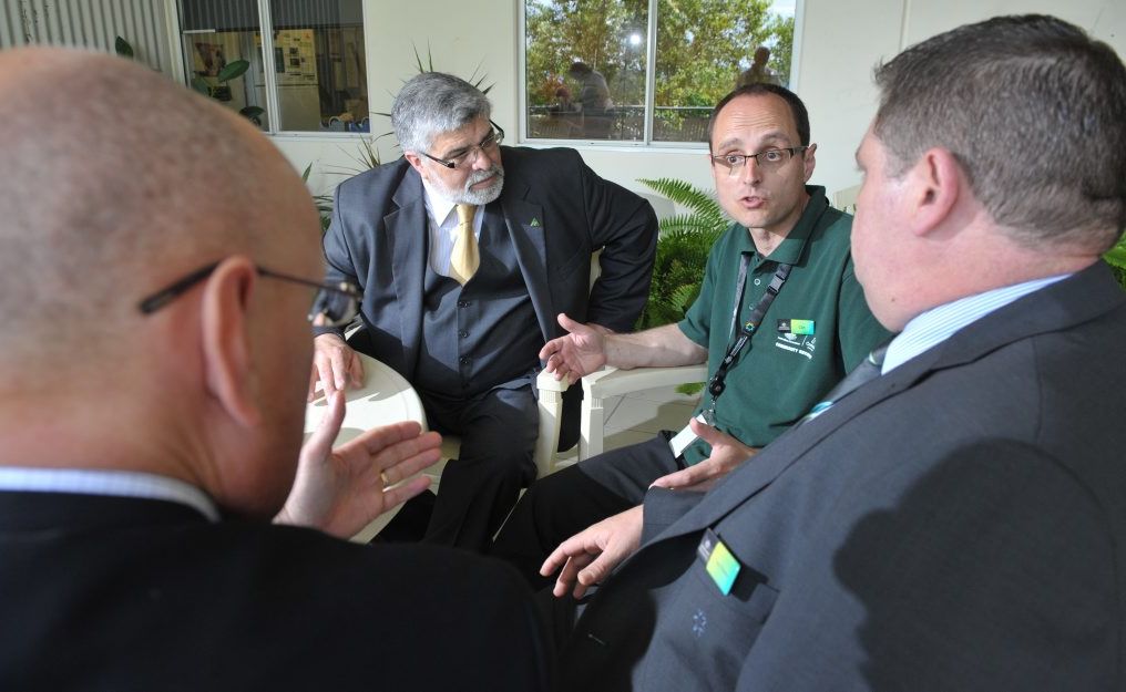 Human Services minister Kim Carr (left) chats with Community recovery "Green Army" member Con Kapoulas, MP Shayne Neumann and Ipswich Centrelink manager Tony Perera at a morning tea to thank staff for their effort during the 2011 flood. Human Services minister Kim Carr (left) chats with Community recovery "Green Army" member Con Kapoulas, MP Shayne Neumann and Ipswich Centrelink manager Tony Perera at a morning tea to thank staff for their effort during the 2011 flood.