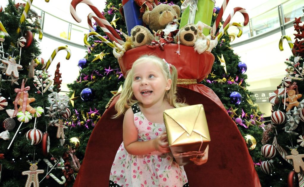 Ella Knudsen,3, playing on Santa's chair at Grand Central Shopping Centre. Ella Knudsen,3, playing on Santa's chair at Grand Central Shopping Centre.