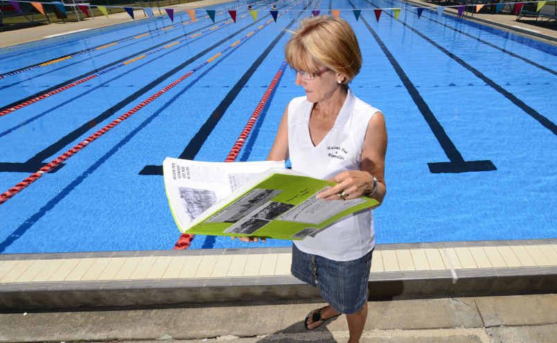 Robyn Clarke looks over a scrapbook of the history of the Maclean Pool. Robyn Clarke looks over a scrapbook of the history of the Maclean Pool.