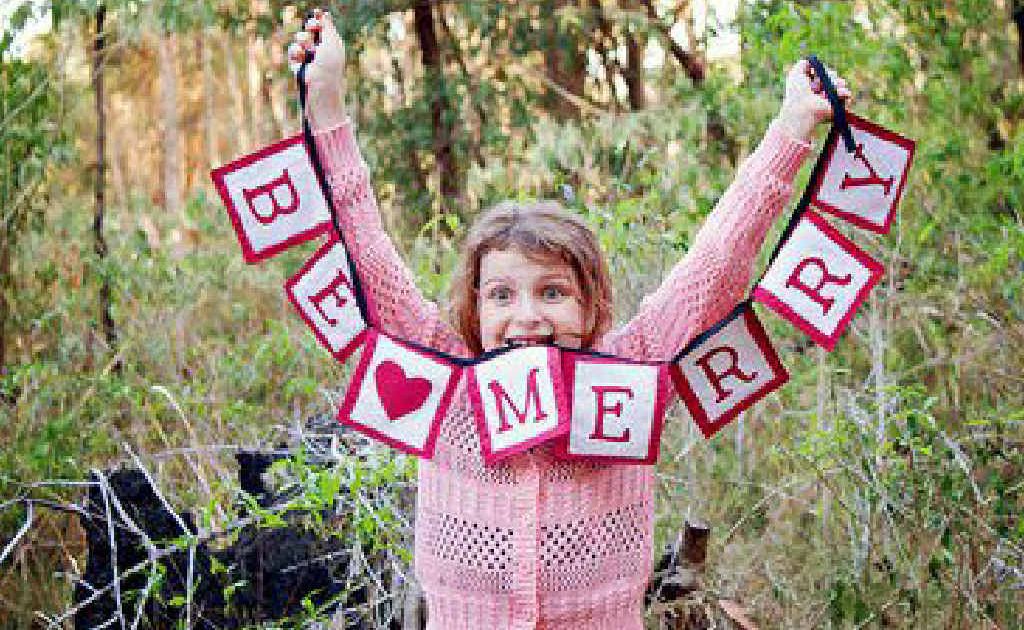 Indiana Hentscher shows off one of the Christmas props made by Nicole Hentscher for the special photo booth at Simply Handmade Markets in Yamba on December 2. Indiana Hentscher shows off one of the Christmas props made by Nicole Hentscher for the special photo booth at Simply Handmade Markets in Yamba on December 2.
