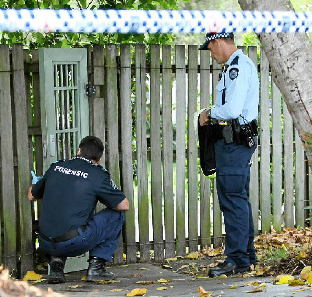 INVESTIGATION: Police at the crime scene following the death. INVESTIGATION: Police at the crime scene following the death.